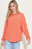 Detail of ribbed sleeve cuff on long sleeve shirt