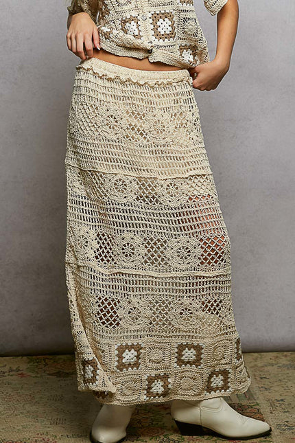 Cream crochet maxi skirt with ruffled waistband and granny square weave pattern in beige and cream tones