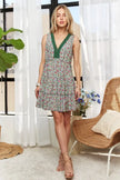 Flattering V-neckline on sleeveless lace mini dress