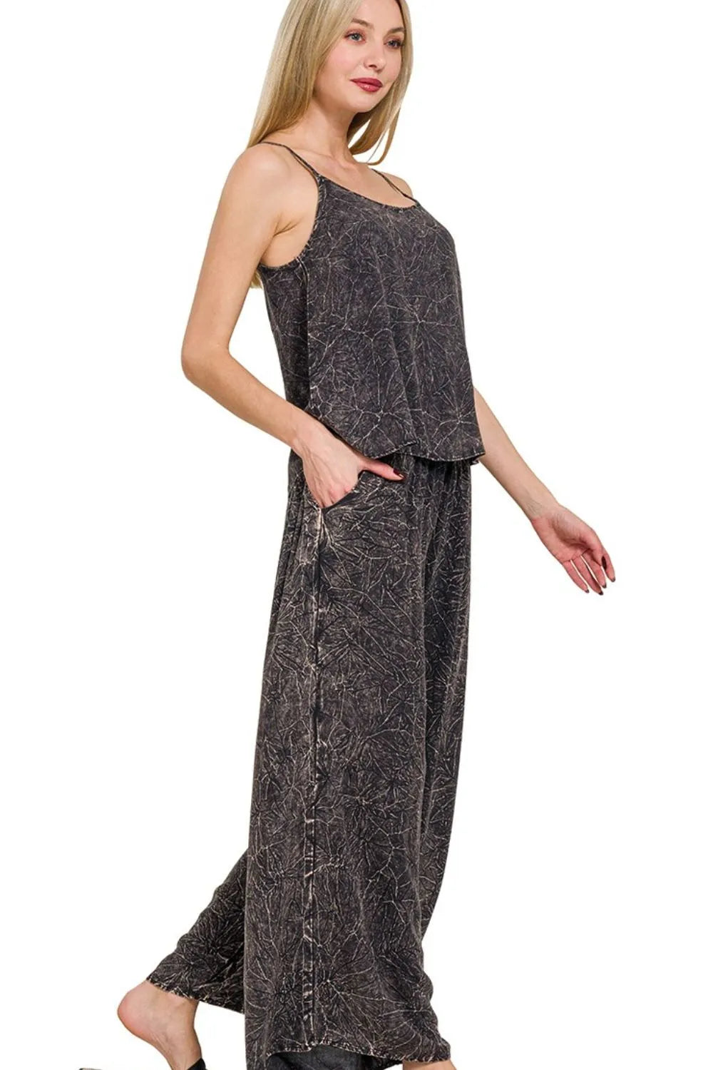 Wide-leg palazzo pants paired with spaghetti-strap cami set
