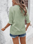 white blouse featuring soft flounce sleeves and semi-sheer eyelet design