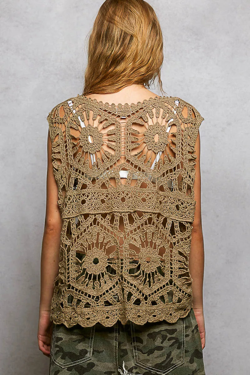 Textured crochet floral pattern on relaxed fit round neck top