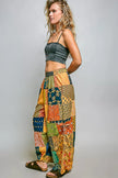 Colorful patchwork wide leg bohemian pants with printed patterns and adjustable drawstring waist