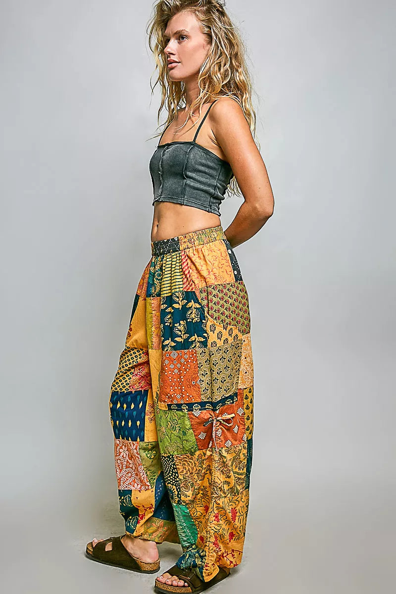 Colorful patchwork wide leg bohemian pants with printed patterns and adjustable drawstring waist
