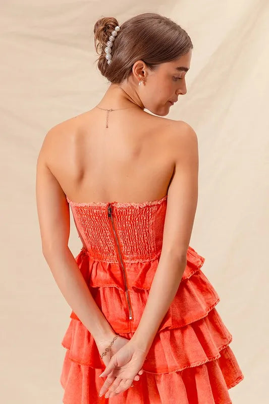 Side view of layered ruffle details on mini dress