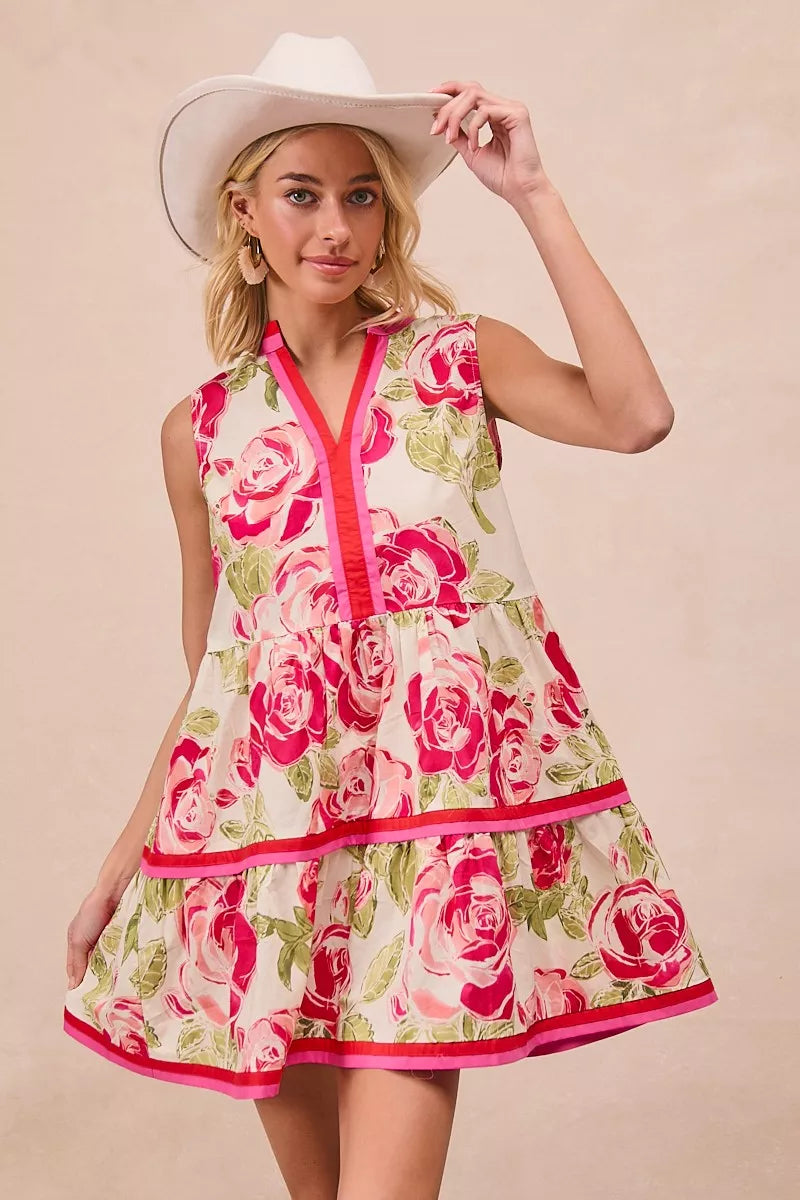 Coral pink floral mini dress with ruffled skirt