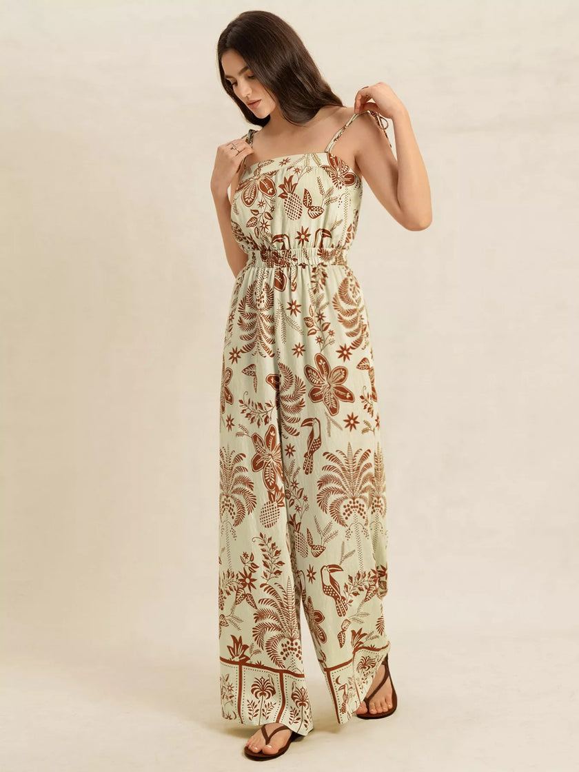 Cream base with brown tropical print, wide leg, smocked waist, tie straps.