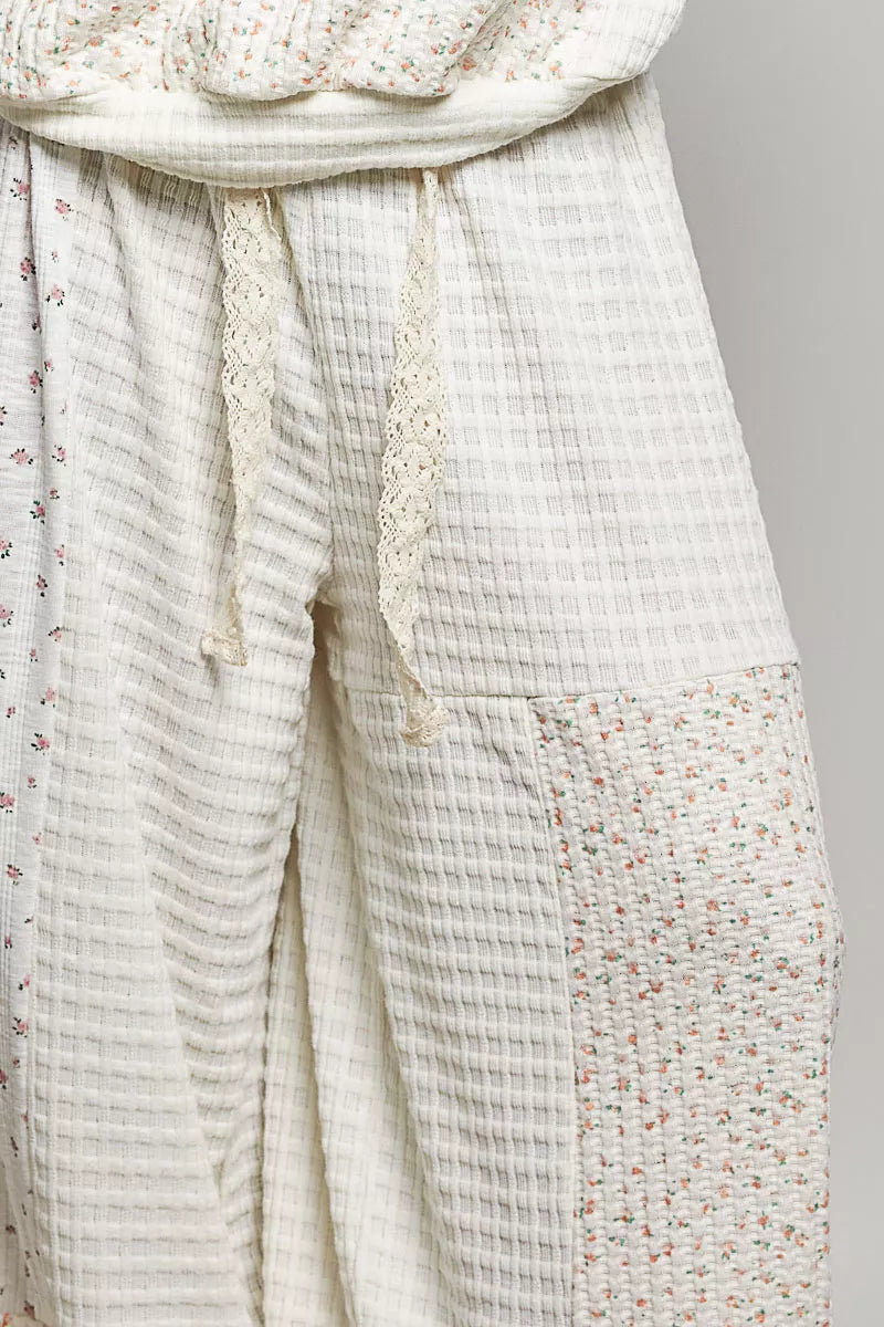 Cream patchwork mixed knit wide leg balloon pants with lace ties and texture