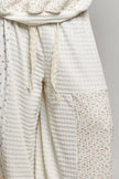 Cream patchwork mixed knit wide leg balloon pants with lace ties and texture