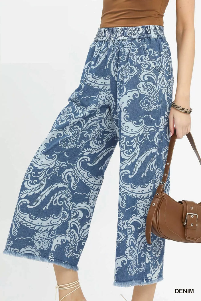 Blue stone wash floral wide leg cropped denim pants with frayed hems
