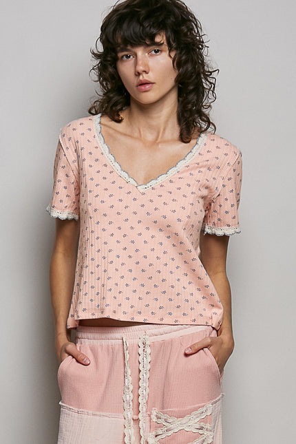 Pink ribbed v-neck short sleeve t-shirt with floral print and white lace trim