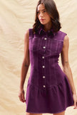 Front view of fitted orchid purple mini dress with button closure