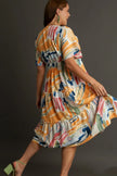 Vibrant abstract print flutter sleeve tiered midi dress with ruffled hem and elastic waist