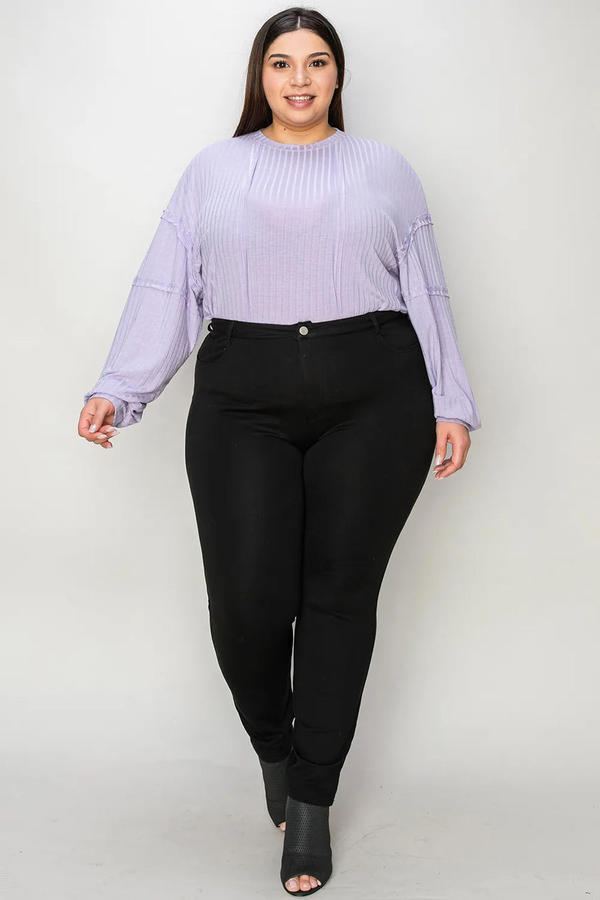 Sleeve detail highlighting ribbed texture on long sleeve shirt