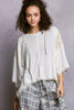 V-neck hoodie top with lace accents and exposed seams
