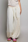 White patchwork mixed knit wide leg balloon pants with lace detail and floral prints