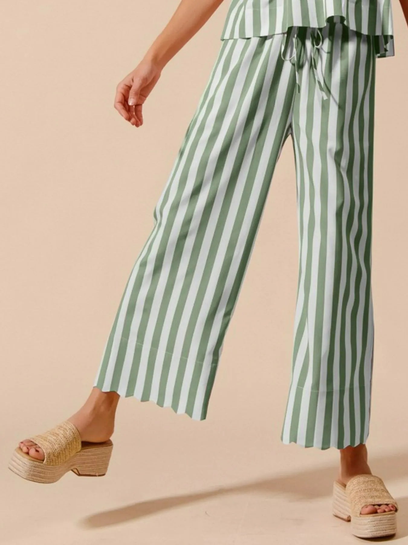 Close-up of tied striped top with soft puff sleeves