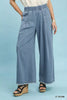 Stone washed light blue wide leg cotton pants with elastic waist and raw hems