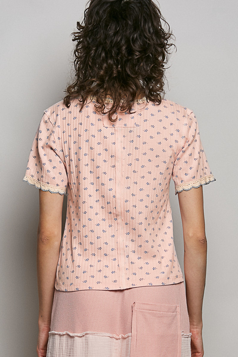 Pink ribbed short sleeve v-neck t-shirt with blue floral print and lace trim
