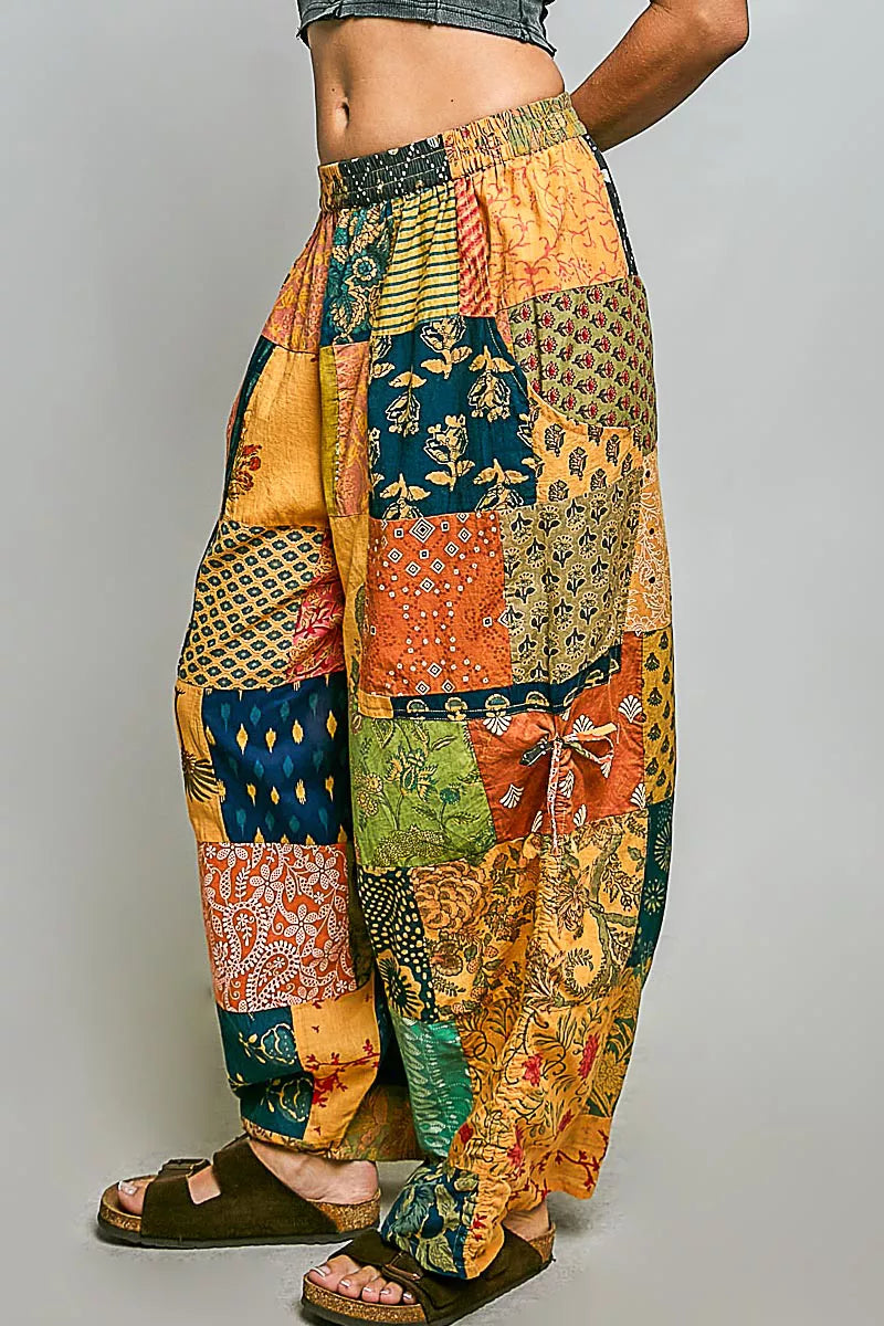 Colorful patchwork wide leg bohemian pants with printed fabric and adjustable drawstring waist