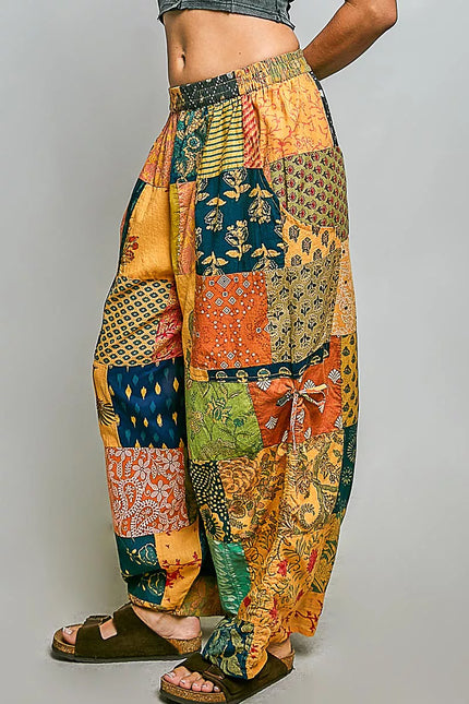 Colorful patchwork wide leg bohemian pants with printed fabric and adjustable drawstring waist
