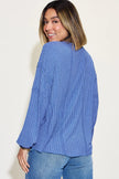Detail of ribbed texture on long sleeve tshirt sleeve