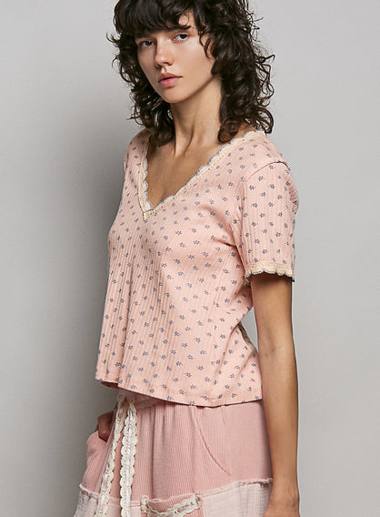 Pink vintage wash ribbed v-neck short sleeve t-shirt with blue floral print and lace trim
