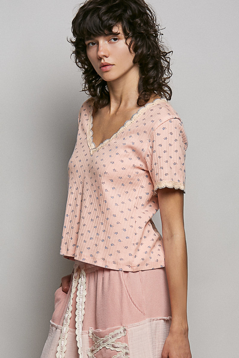 Pink vintage wash ribbed v-neck short sleeve t-shirt with blue floral print and lace trim