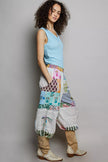 Multicolor patchwork wide leg pants with drawstring sides and mixed printed fabric textures