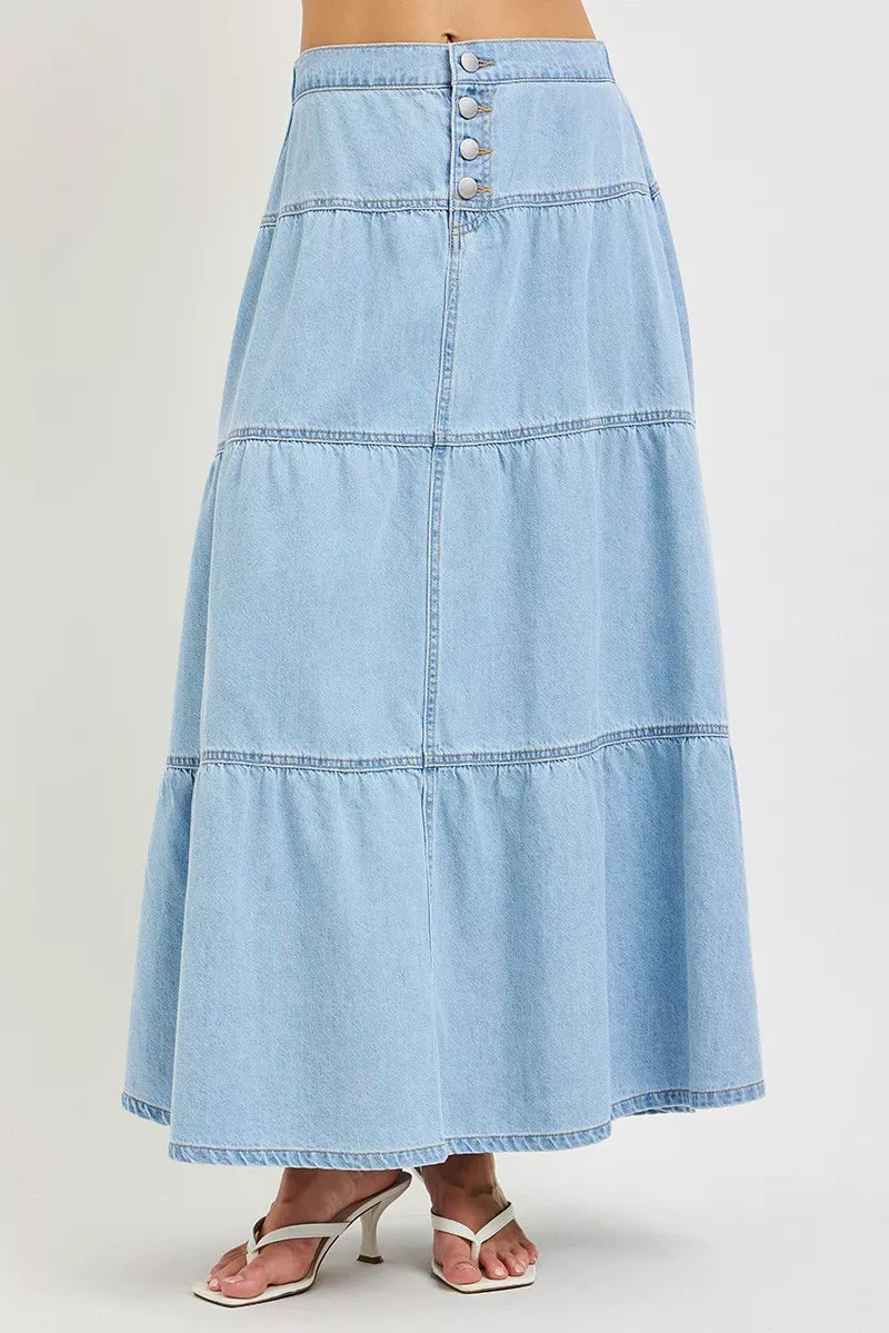 Light blue high-rise tiered denim maxi skirt with button front and ruffle hem