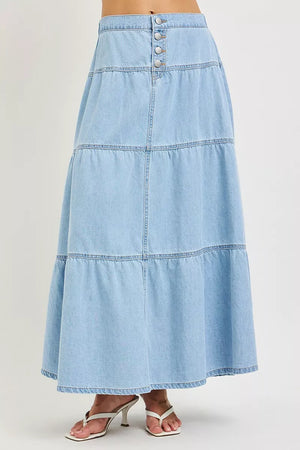 Light blue high-rise tiered denim maxi skirt with button front and ruffle hem