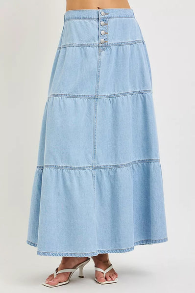 Light blue high-rise tiered denim maxi skirt with button front and ruffle hem