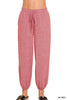 Deep red drawstring joggers with elastic waistband and cuffed hem