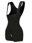 Woman modeling black shaper emphasizing smooth hip contour