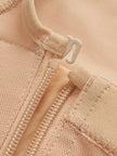 Close-up of black shaper fabric showing smooth texture
