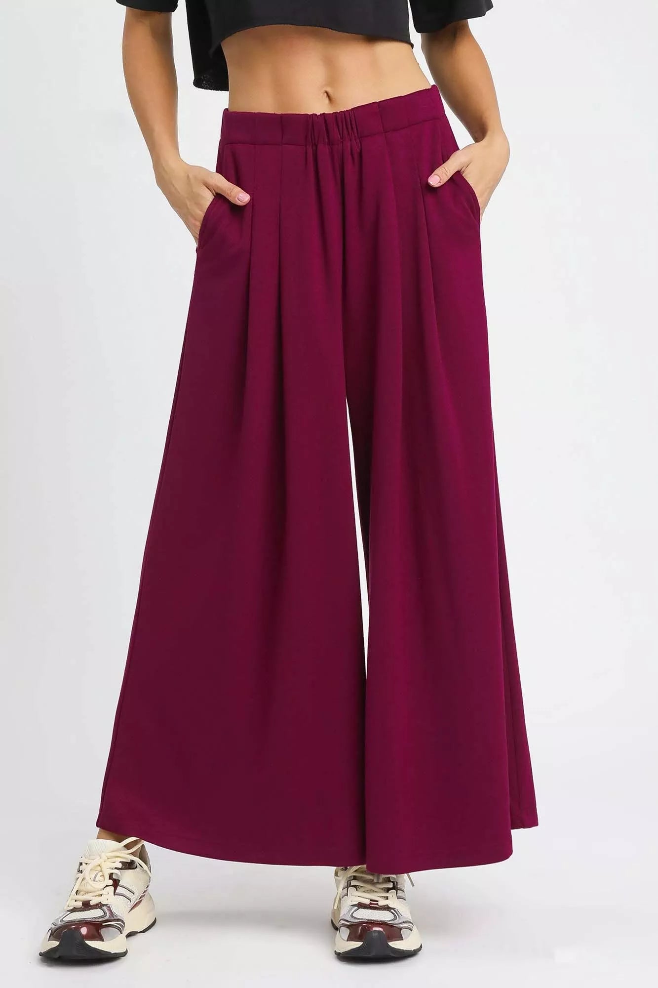 Merlot red wide-leg pants with pintuck detailing and elastic waistband
