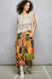 Multicolor patchwork wide leg pants with earthy prints and adjustable drawstring waist