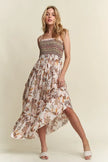 Printed rayon dress with adjustable tie shoulders and smocked details