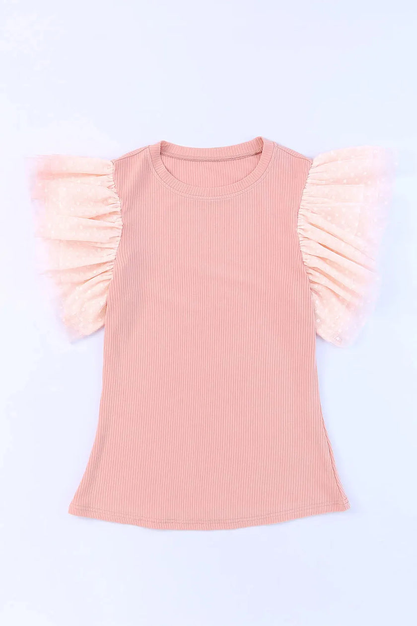 Pink ribbed blouse with ruffled cap sleeves and polka dot mesh accents