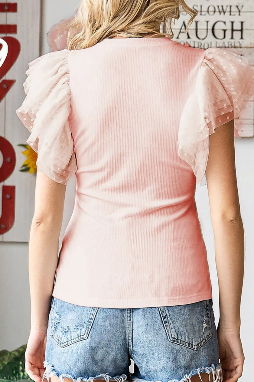 Pink ribbed blouse with ruffled cap sleeves and round neck fit