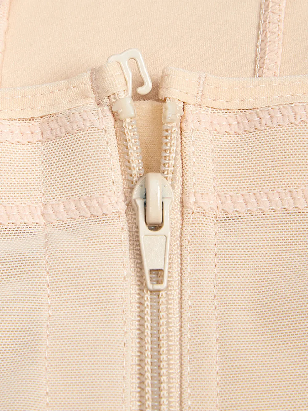 Pastel pink long sleeve top with detailed floral embroidery