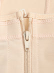 Pastel pink long sleeve top with detailed floral embroidery