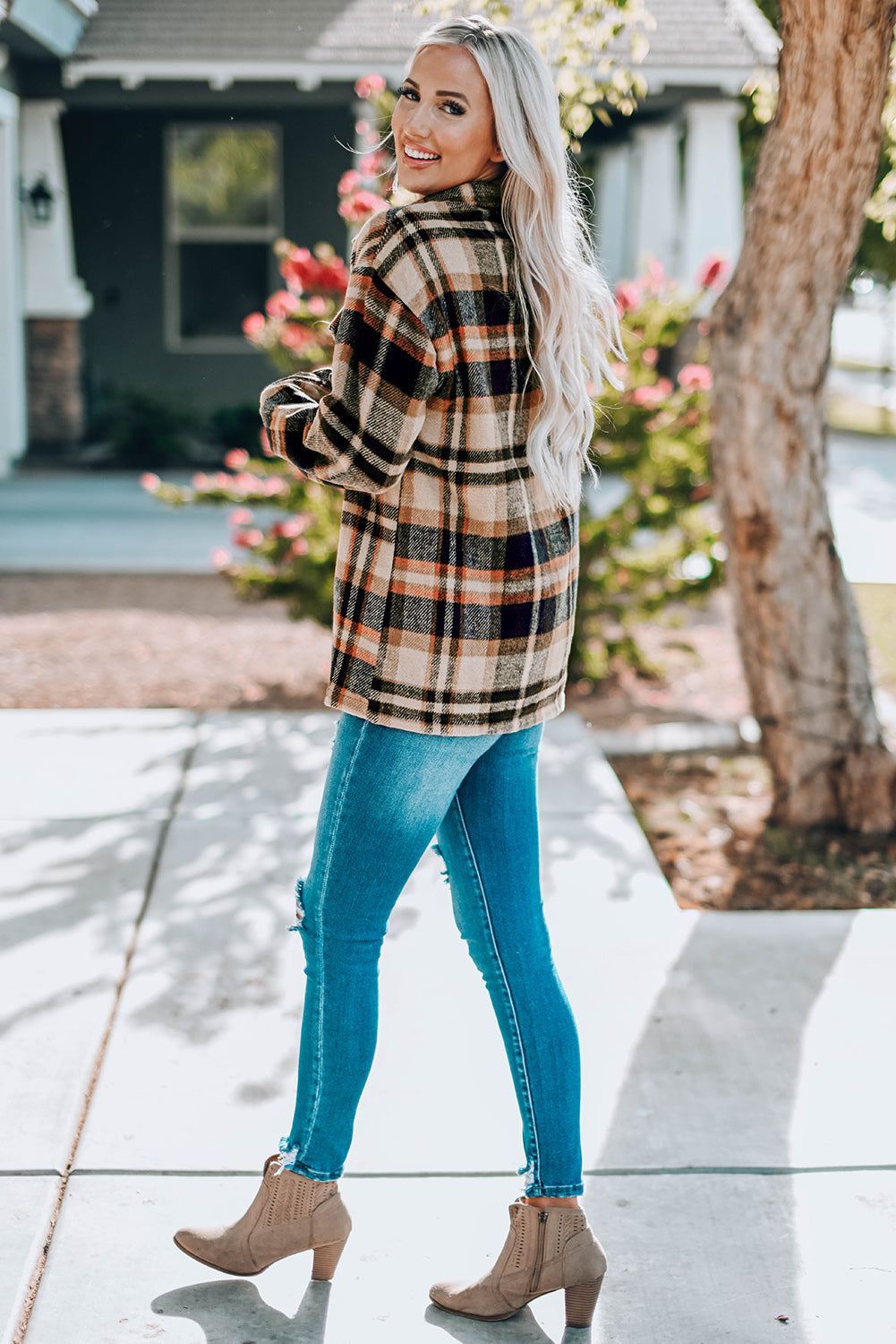 Classic plaid shirt jacket with button closure and relaxed fit, perfect for layering