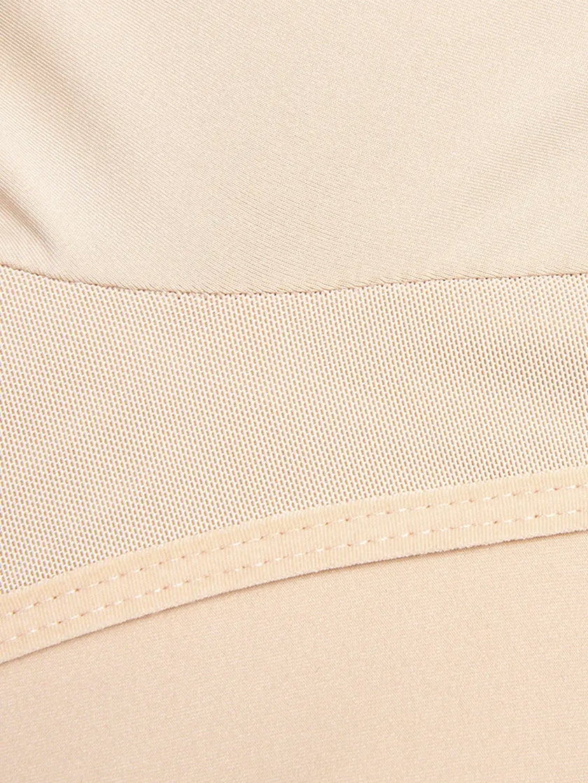 Delicate floral embroidery and ruffles on long sleeve top in pink