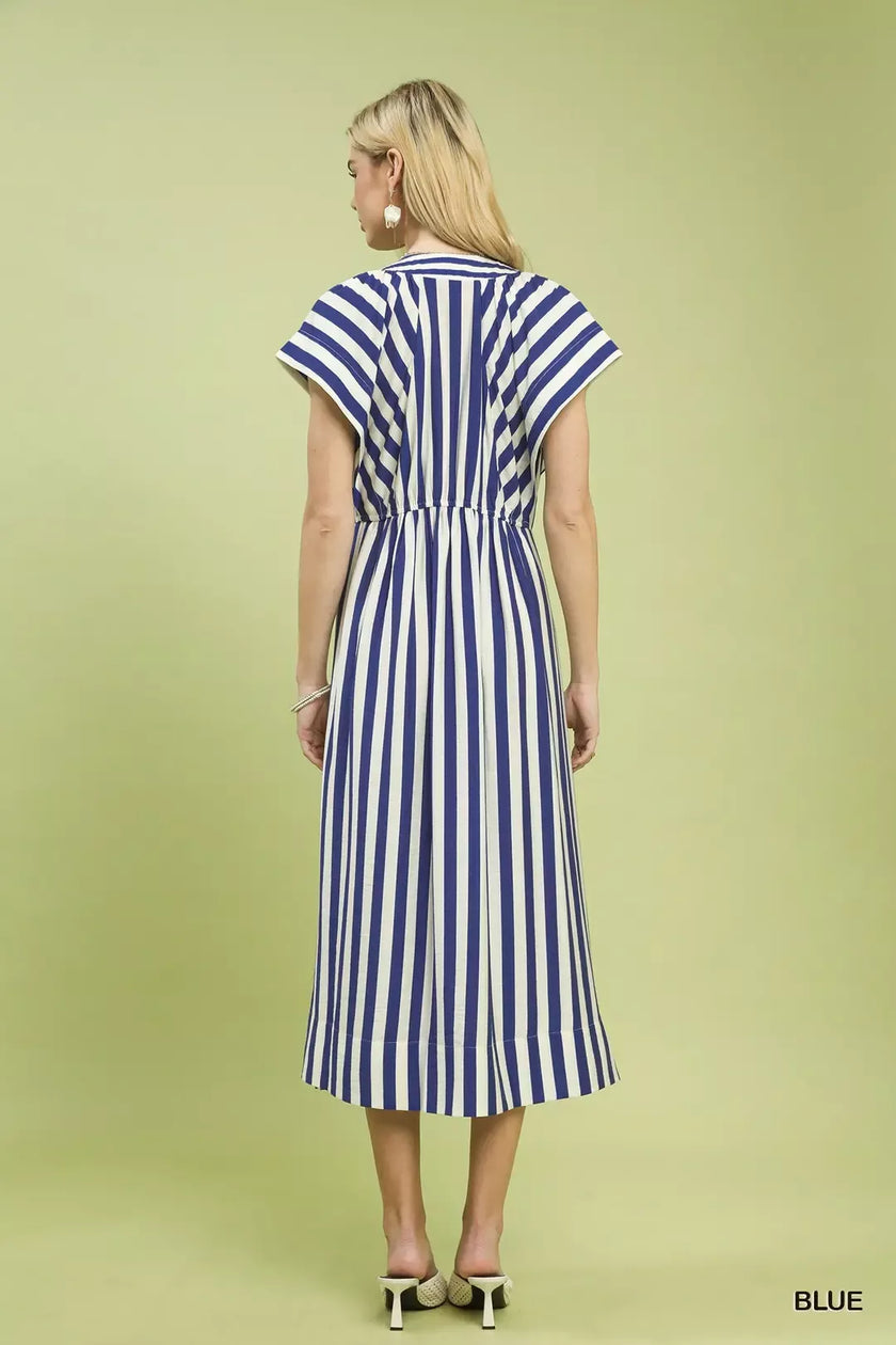 Floral-cream striped midi dress with button-front ruffle detail, sleek fitted silhouette, casual-chic elegant look.