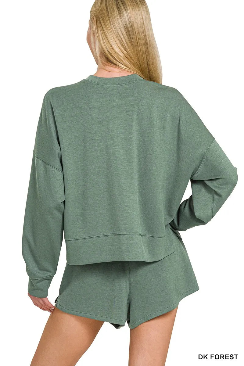 Forest green scuba fabric two-piece outfit with subtle stretch detail