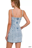Light-wash denim dress with spaghetti straps and exposed seam back zipper detail