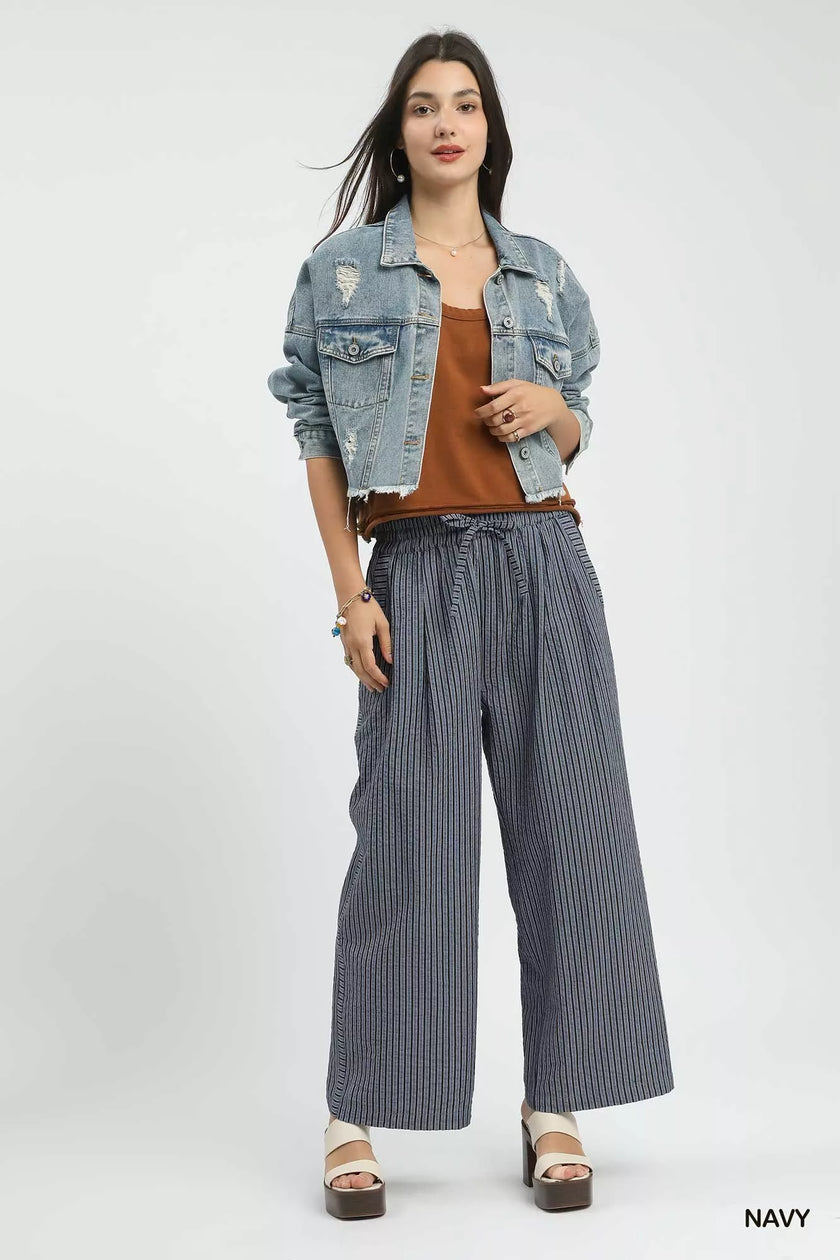 Wide-leg pants showcasing relaxed fit and striped design
