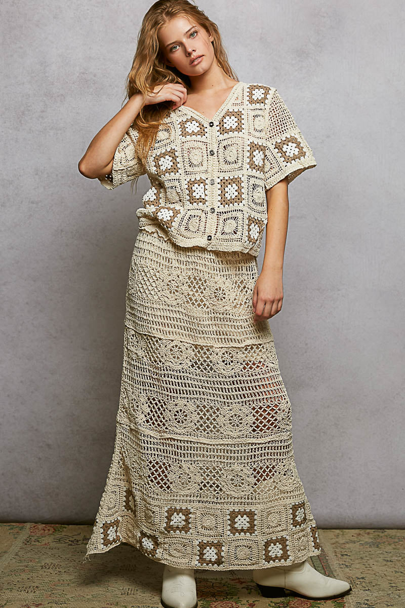 Cream crochet maxi skirt with brown granny square pattern and ruffled waistband