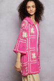 Relaxed fit crochet top with bold collar and granny square floral pattern
